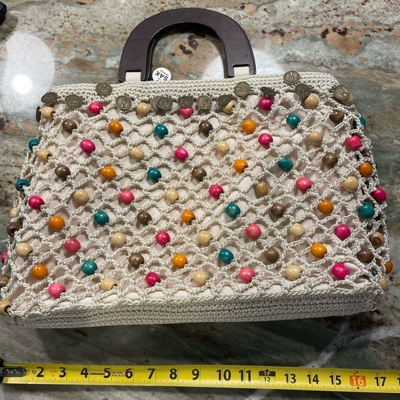 The Sak Handbags - THE SAK - Crochet handbag with wooden beads, coins and wooden handle.